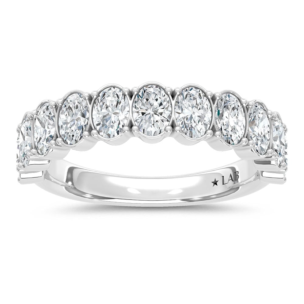 14K White Gold Lab Grown Diamond 4 Ct.Tw. Oval Shape Wedding Band: 14K White Gold Lab Grown Diamond 4 Ct.Tw. Oval Shape Wedding Band This exquisite 14K White Gold Wedding Band, set with 4 Ct.Tw. of Oval Lab Grown Diamonds, is the perfect combination of elegance and g