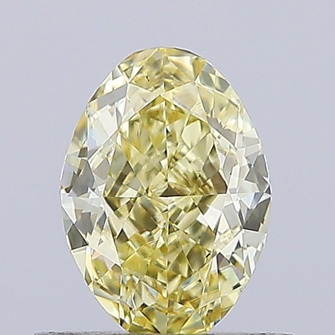 Loose Diamond - OVAL 0.68ct Fancy Light Yellow VS1: Loose Diamond - OVAL 0.68ct Fancy Light Yellow VS1 Source: This is a real non-mined Diamond that has been grown in a lab Shape: OVAL Carats: 0.68 Color: Fancy Light Yellow Certification: IGI Video: