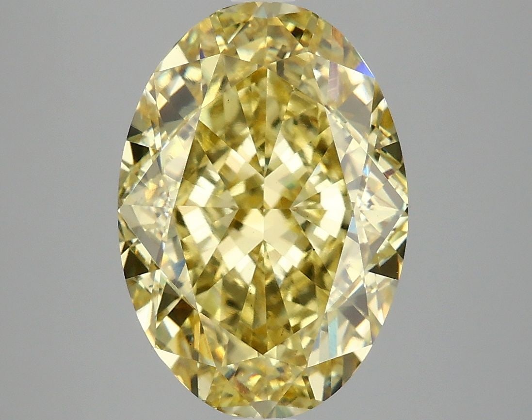 Loose Diamond - OVAL 5.1ct Fancy Vivid Yellow VS1: Loose Diamond - OVAL 5.1ct Fancy Vivid Yellow VS1 Source: This is a real non-mined Diamond that has been grown in a lab Shape: OVAL Carats: 5.1 Color: Fancy Vivid Yellow Certification: IGI Video:
