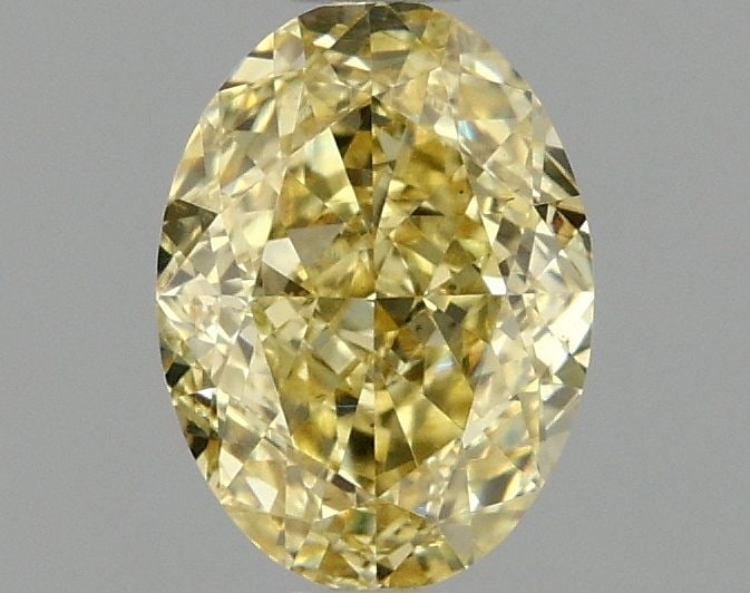 Loose Diamond - OVAL 1.04ct Fancy Intense Yellow VS2: Loose Diamond - OVAL 1.04ct Fancy Intense Yellow VS2 Source: This is a real non-mined Diamond that has been grown in a lab Shape: OVAL Carats: 1.04 Color: Fancy Intense Yellow Certification: IGI