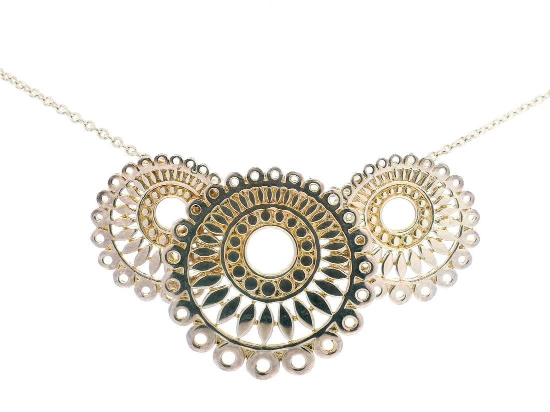 Kit Heath Sterling Silver Adjustable Sun Fan Pendant Necklace: Kit Heath Sterling Silver Adjustable Sun Fan Pendant Necklace This exquisite pendant features a layered sun fan design crafted from high-quality sterling silver (.925). The necklace comes with an adju