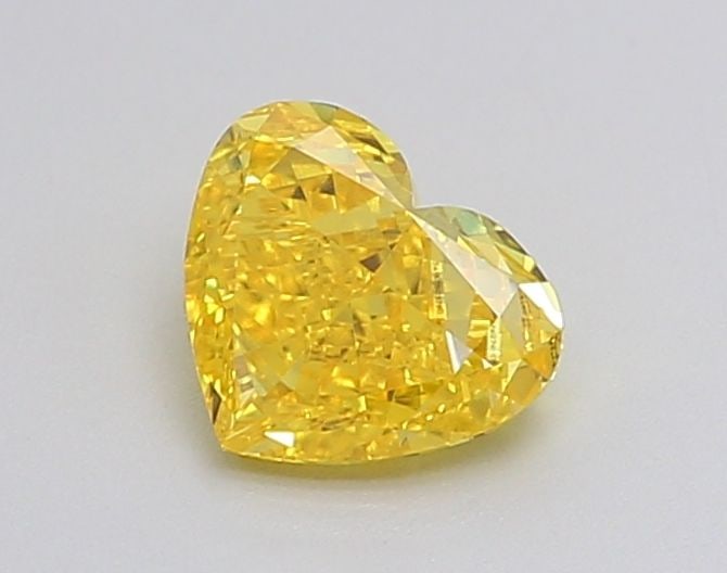 Loose Diamond - HEART 0.61ct Fancy Vivid Yellow VVS2: Loose Diamond - HEART 0.61ct Fancy Vivid Yellow VVS2 Source: This is a real non-mined Diamond that has been grown in a lab Shape: HEART Carats: 0.61 Color: Fancy Vivid Yellow Certification: IGI Video: