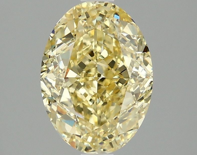 Loose Diamond - OVAL 2.09ct Fancy Intense Yellow VVS2: Loose Diamond - OVAL 2.09ct Fancy Intense Yellow VVS2 Source: This is a real non-mined Diamond that has been grown in a lab Shape: OVAL Carats: 2.09 Color: Fancy Intense Yellow Certification: IGI Vide