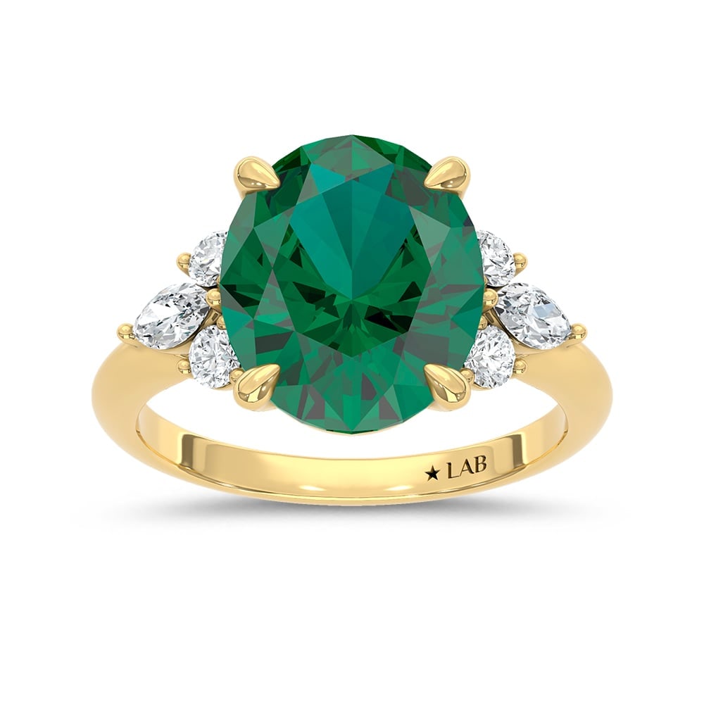 14K Yellow Gold Lab Grown Diamond 5 3/8 Ct.Tw. Oval Shape Recrystalized Emerald Engagement Ring: 14K Yellow Gold Lab Grown Diamond 5 3/8 Ct.Tw. Oval Shape Recrystalized Emerald Engagement Ring (Center 5 ct) Celebrate refined elegance with this 14K yellow gold engagement ring. Its centerpiece is a