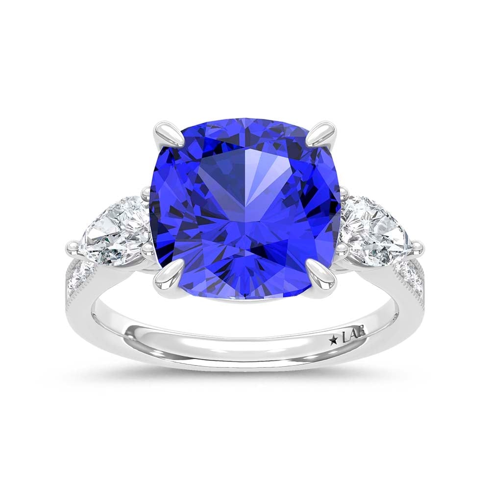 14K White Gold Lab Grown Diamond 6 1/2 Ct.Tw. Cushion Shape Recrystalized Blue Sapphire Engagement: 14K White Gold Lab Grown Diamond 6 1/2 Ct.Tw. Cushion Shape Recrystalized Blue Sapphire Engagement Ring (Center 5 3/4 ct) Exude timeless elegance with this 14K white gold engagement ring, featuring a