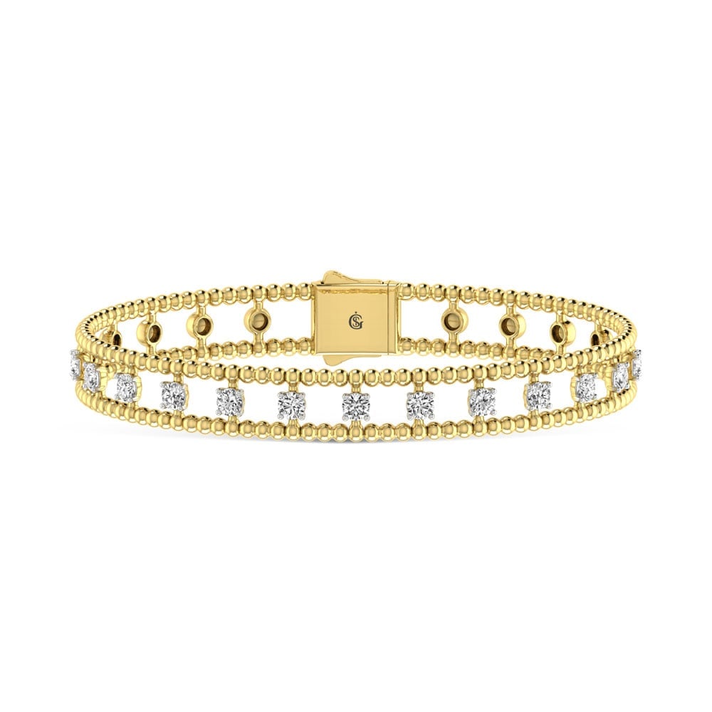 14K Yellow Gold Lab Grown Yellow and White Diamond 1 1/3 Ct.Tw Flexi Bangle: 14K Yellow Gold Lab Grown Yellow and White Diamond 1 1/3 Ct.Tw Flexi Bangle This 14K Yellow Gold flexi bangle features lab grown yellow and white diamonds totaling 1 1/3 Ct.Tw., offering luminous two-