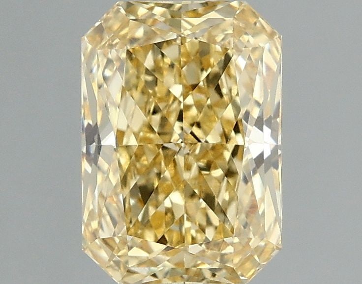 Loose Diamond - RADIANT 1.59ct Fancy Vivid Yellow VVS2: Loose Diamond - RADIANT 1.59ct Fancy Vivid Yellow VVS2 Source: This is a real non-mined Diamond that has been grown in a lab Shape: RADIANT Carats: 1.59 Color: Fancy Vivid Yellow Certification: IGI Vi