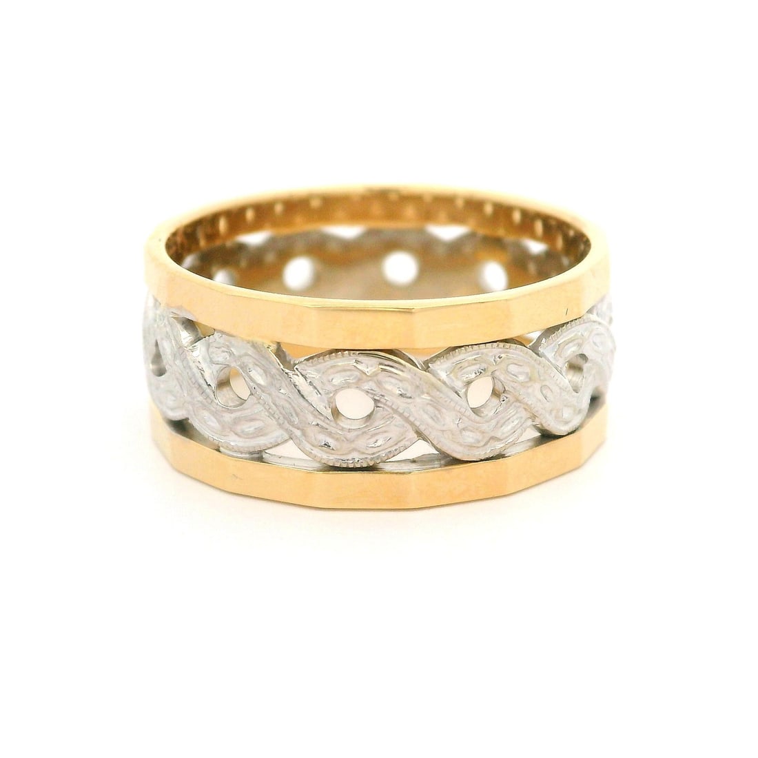 Vintage 14k Yellow White Gold Braided Wide Band Ring: Vintage 14k Yellow White Gold Braided Wide Band Ring This stunning vintage ring showcases a unique braided design crafted from 14k yellow and white gold. The wide band features a faceted edge that add