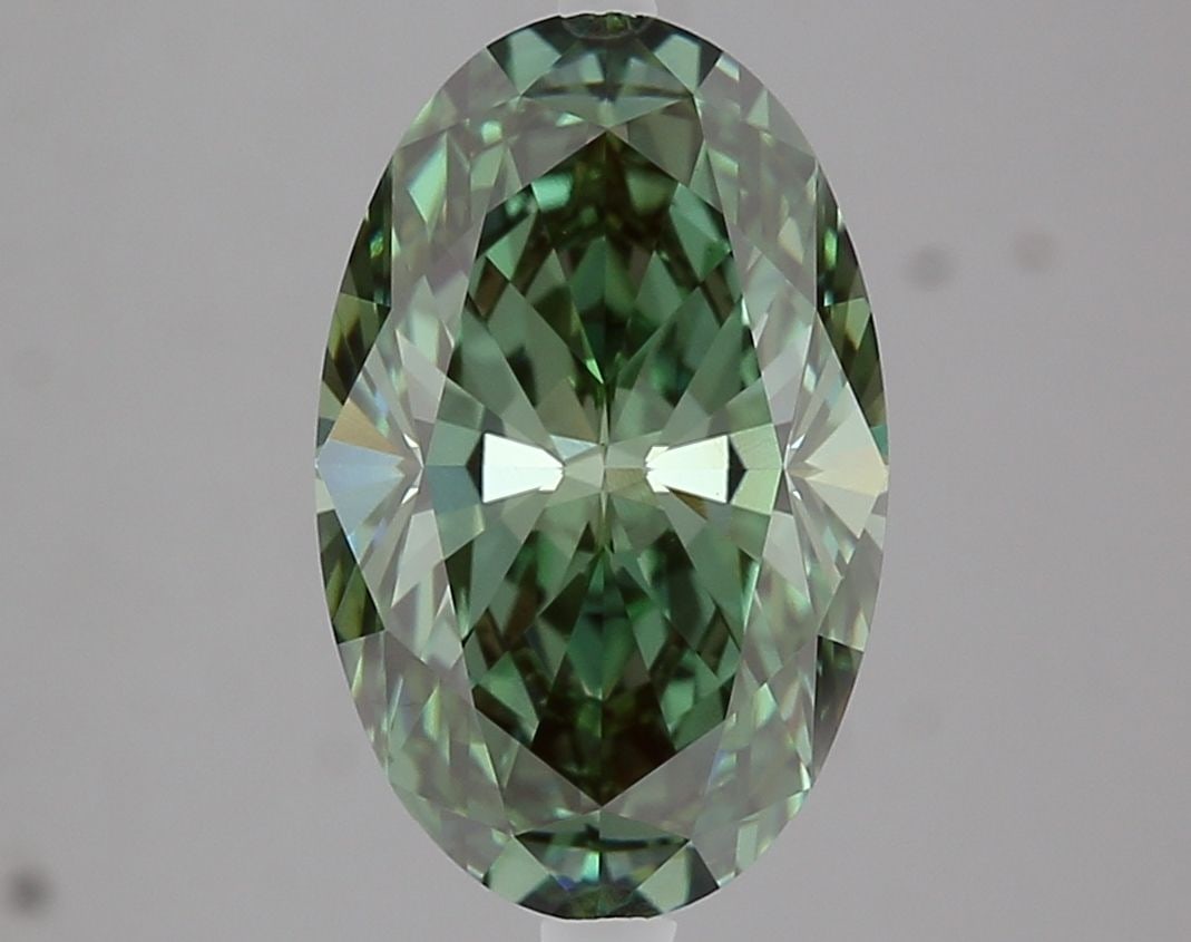 Loose Diamond - OVAL 3.04ct Fancy Vivid Green VVS2: Loose Diamond - OVAL 3.04ct Fancy Vivid Green VVS2 Source: This is a real non-mined Diamond that has been grown in a lab Shape: OVAL Carats: 3.04 Color: Fancy Vivid Green Certification: IGI Video: