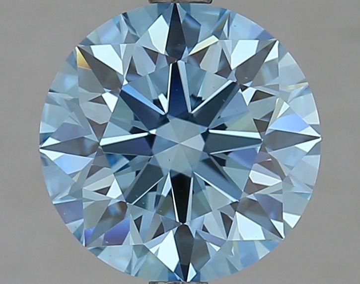 Ideal Loose Diamond - ROUND 3.02ct Fancy Vivid Blue VS2: Ideal Loose Diamond - ROUND 3.02ct Fancy Vivid Blue VS2 Source: This is a real non-mined Diamond that has been grown in a lab Shape: ROUND Carats: 3.02 Color: Fancy Vivid Blue Certification: IGI