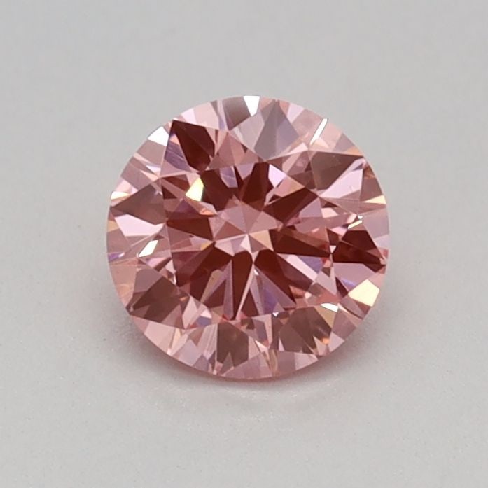 Loose Diamond - ROUND 0.31ct Fancy Vivid Pink VS1: Loose Diamond - ROUND 0.31ct Fancy Vivid Pink VS1 Source: This is a real non-mined Diamond that has been grown in a lab Shape: ROUND Carats: 0.31 Color: Fancy Vivid Pink Certification: IGI Video:
