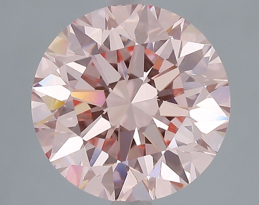 Loose Diamond - ROUND 4.01ct Fancy Vivid Pink VS1: Loose Diamond - ROUND 4.01ct Fancy Vivid Pink VS1 Source: This is a real non-mined Diamond that has been grown in a lab Shape: ROUND Carats: 4.01 Color: Fancy Vivid Pink Certification: IGI Video: