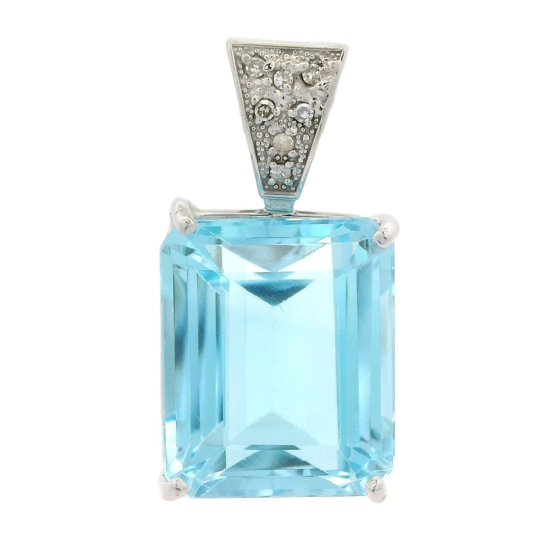 Vintage 14k White Gold Blue Topaz Diamond Pendant 19.85ct: Vintage 14k White Gold Blue Topaz Diamond Pendant 19.85ct This exquisite vintage pendant features a stunning natural blue topaz gemstone, elegantly cut in an emerald shape and prong set to showcase it