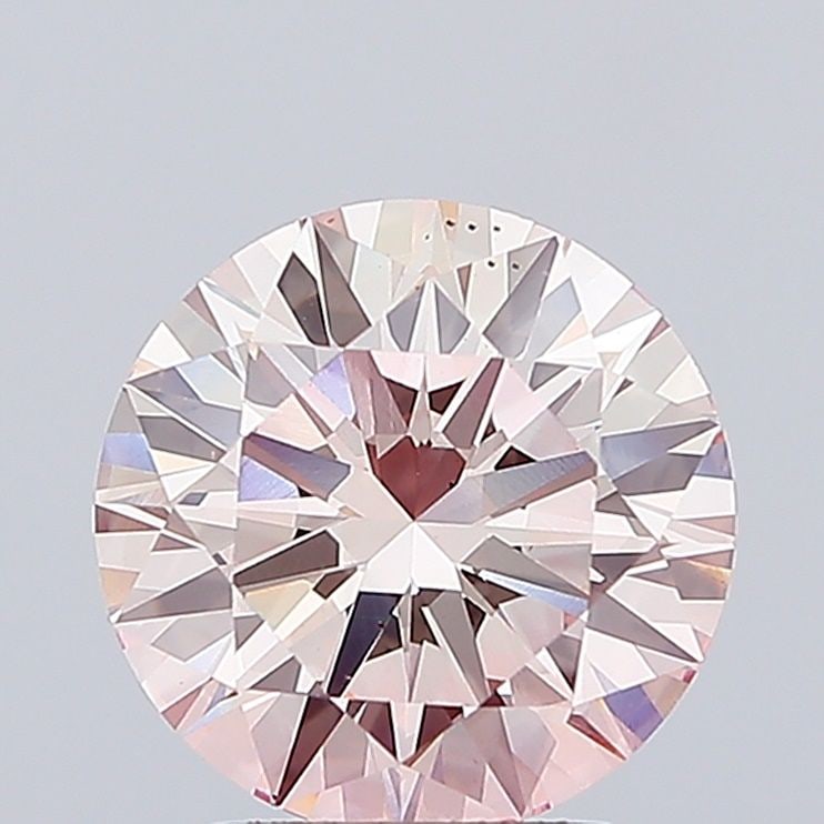 Loose Diamond - ROUND 3.11ct Fancy Vivid Pink VS2: Loose Diamond - ROUND 3.11ct Fancy Vivid Pink VS2 Source: This is a real non-mined Diamond that has been grown in a lab Shape: ROUND Carats: 3.11 Color: Fancy Vivid Pink Certification: IGI Video: