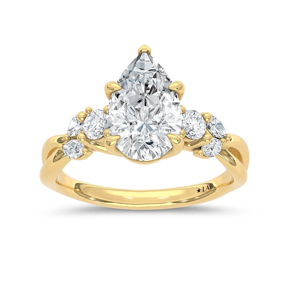 14K Yellow Gold 2 1/3 Ct.Tw. Lab Grown Diamond Pear Shape Engagement Ring (IGI Certified Center 2ct: 14K Yellow Gold 2 1/3 Ct.Tw. Lab Grown Diamond Pear Shape Engagement Ring (IGI Certified Center 2ct Pear) Celebrate your love with this elegant 14K Yellow gold engagement ring, featuring a 2-carat IGI