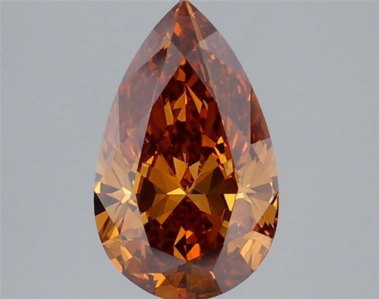 Loose Diamond - PEAR 2.12ct Fancy Vivid Brownish Orange VS1: Loose Diamond - PEAR 2.12ct Fancy Vivid Brownish Orange VS1 Source: This is a real non-mined Diamond that has been grown in a lab Shape: PEAR Carats: 2.12 Color: Fancy Vivid Brownish Orange Certificat