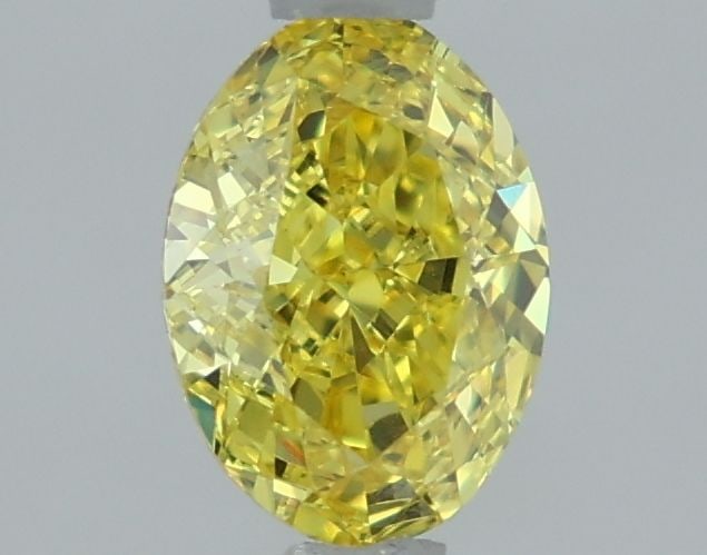 Loose Diamond - OVAL 1.14ct Fancy Vivid Yellow VVS2: Loose Diamond - OVAL 1.14ct Fancy Vivid Yellow VVS2 Source: This is a real non-mined Diamond that has been grown in a lab Shape: OVAL Carats: 1.14 Color: Fancy Vivid Yellow Certification: IGI Video: