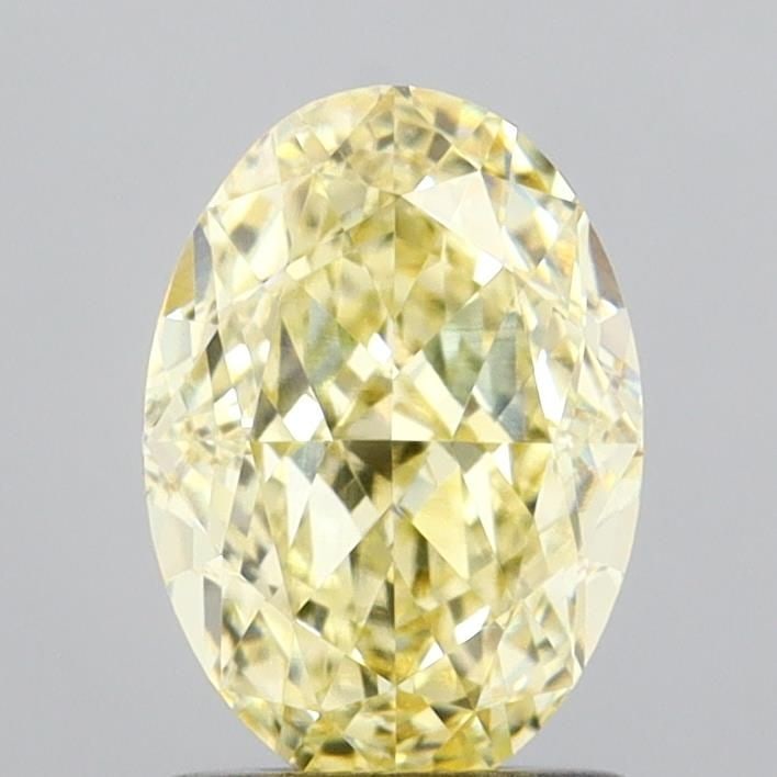 Loose Diamond - OVAL 1.59ct Fancy Light Yellow VVS2: Loose Diamond - OVAL 1.59ct Fancy Light Yellow VVS2 Source: This is a real non-mined Diamond that has been grown in a lab Shape: OVAL Carats: 1.59 Color: Fancy Light Yellow Certification: IGI Video: