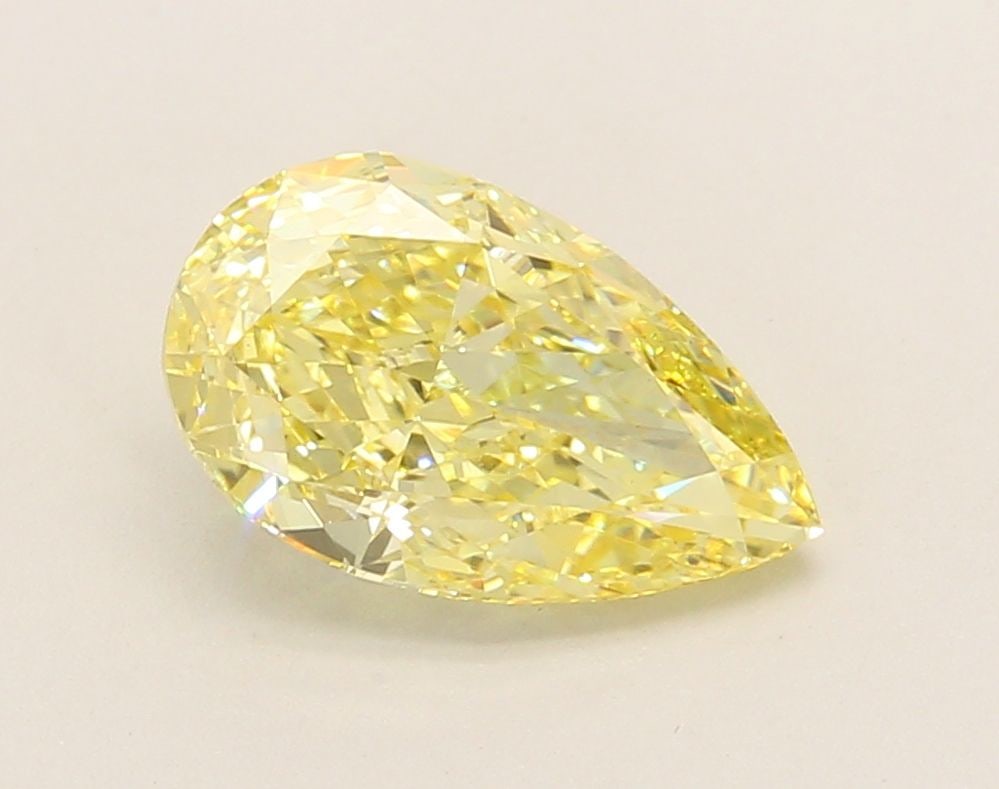 Loose Diamond - PEAR 2.18ct Fancy Intense Yellow VS1: Loose Diamond - PEAR 2.18ct Fancy Intense Yellow VS1 Source: This is a real non-mined Diamond that has been grown in a lab Shape: PEAR Carats: 2.18 Color: Fancy Intense Yellow Certification: IGI