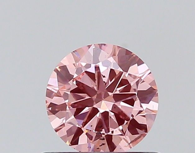 Loose Diamond - ROUND 0.52ct Fancy Vivid Pink SI1: Loose Diamond - ROUND 0.52ct Fancy Vivid Pink SI1 Source: This is a real non-mined Diamond that has been grown in a lab Shape: ROUND Carats: 0.52 Color: Fancy Vivid Pink Certification: NONE The