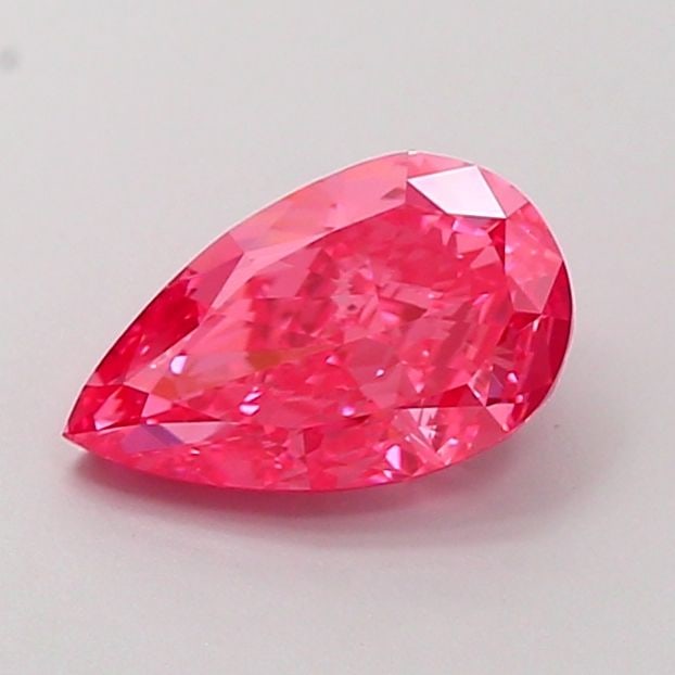 Loose Diamond - PEAR 1.38ct Fancy Vivid Pink VVS1: Loose Diamond - PEAR 1.38ct Fancy Vivid Pink VVS1 Source: This is a real non-mined Diamond that has been grown in a lab Shape: PEAR Carats: 1.38 Color: Fancy Vivid Pink Certification: IGI Video: