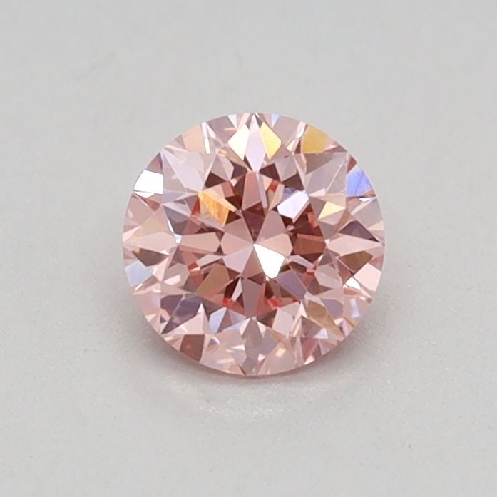 Loose Diamond - ROUND 0.33ct Fancy Vivid Pink VVS2: Loose Diamond - ROUND 0.33ct Fancy Vivid Pink VVS2 Source: This is a real non-mined Diamond that has been grown in a lab Shape: ROUND Carats: 0.33 Color: Fancy Vivid Pink Certification: IGI Video: