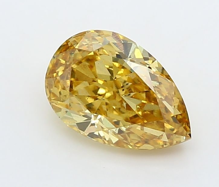 Loose Diamond - PEAR 1.7ct Fancy Vivid Yellow VS1: Loose Diamond - PEAR 1.7ct Fancy Vivid Yellow VS1 Source: This is a real non-mined Diamond that has been grown in a lab Shape: PEAR Carats: 1.7 Color: Fancy Vivid Yellow Certification: IGI Video: