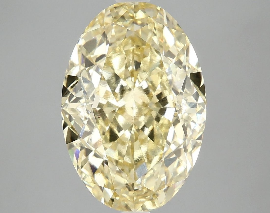 Loose Diamond - OVAL 5.09ct Fancy Intense Yellow VS1: Loose Diamond - OVAL 5.09ct Fancy Intense Yellow VS1 Source: This is a real non-mined Diamond that has been grown in a lab Shape: OVAL Carats: 5.09 Color: Fancy Intense Yellow Certification: IGI Video