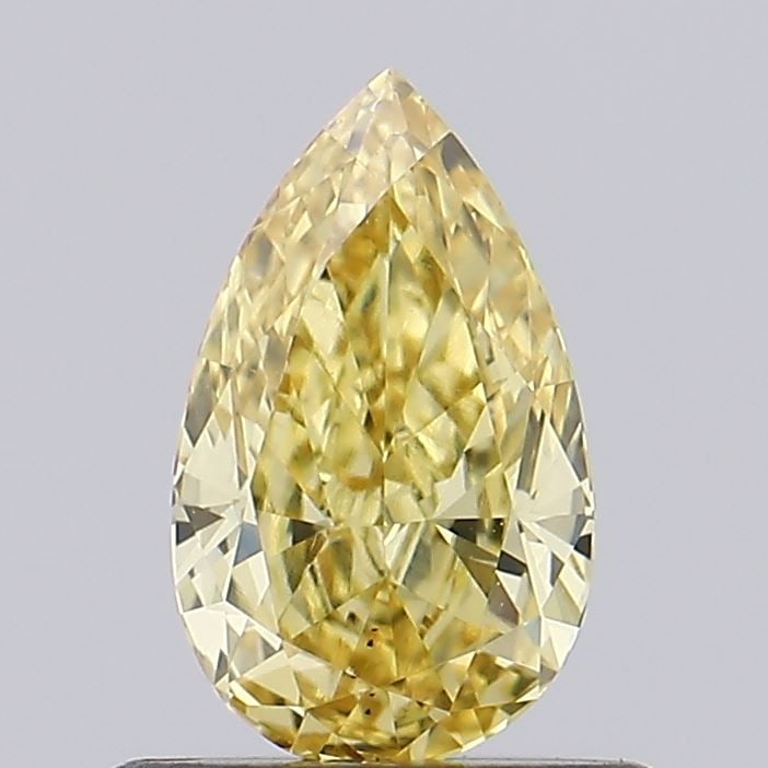 Loose Diamond - PEAR 0.68ct Fancy Vivid Yellow VS1: Loose Diamond - PEAR 0.68ct Fancy Vivid Yellow VS1 Source: This is a real non-mined Diamond that has been grown in a lab Shape: PEAR Carats: 0.68 Color: Fancy Vivid Yellow Certification: NONE Video: