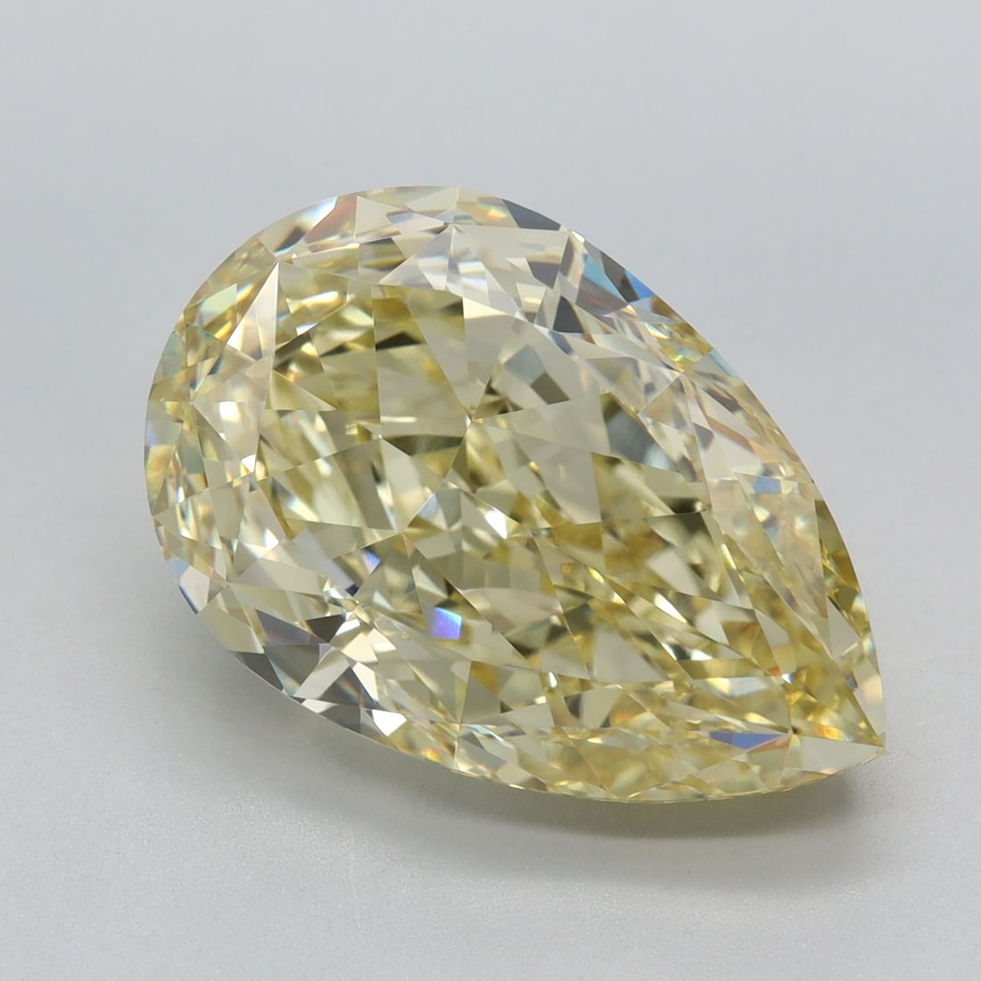 Loose Diamond - PEAR 7.53ct Fancy Intense Yellow VVS2: Loose Diamond - PEAR 7.53ct Fancy Intense Yellow VVS2 Source: This is a real non-mined Diamond that has been grown in a lab Shape: PEAR Carats: 7.53 Color: Fancy Intense Yellow Certification: IGI