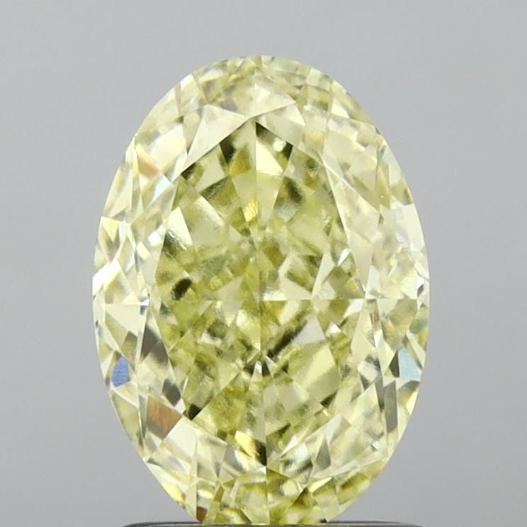 Loose Diamond - OVAL 2.09ct Fancy Light Yellow VVS2: Loose Diamond - OVAL 2.09ct Fancy Light Yellow VVS2 Source: This is a real non-mined Diamond that has been grown in a lab Shape: OVAL Carats: 2.09 Color: Fancy Light Yellow Certification: IGI Video: