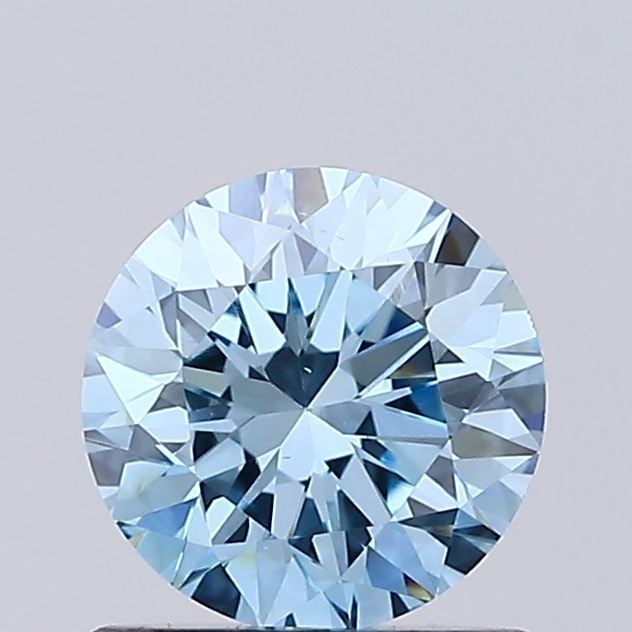 Loose Diamond - ROUND 0.76ct Fancy Vivid Blue VS1: Loose Diamond - ROUND 0.76ct Fancy Vivid Blue VS1 Source: This is a real non-mined Diamond that has been grown in a lab Shape: ROUND Carats: 0.76 Color: Fancy Vivid Blue Certification: IGI Video: