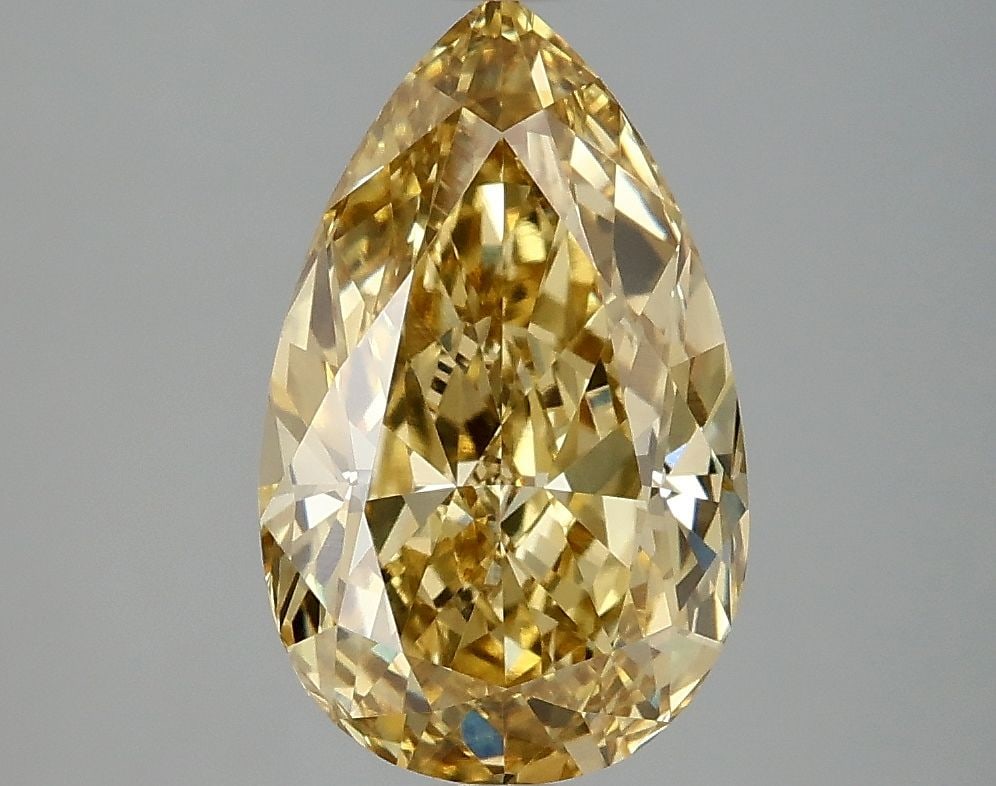 Loose Diamond - PEAR 3.07ct Fancy Vivid Yellow VVS2: Loose Diamond - PEAR 3.07ct Fancy Vivid Yellow VVS2 Source: This is a real non-mined Diamond that has been grown in a lab Shape: PEAR Carats: 3.07 Color: Fancy Vivid Yellow Certification: IGI Video: