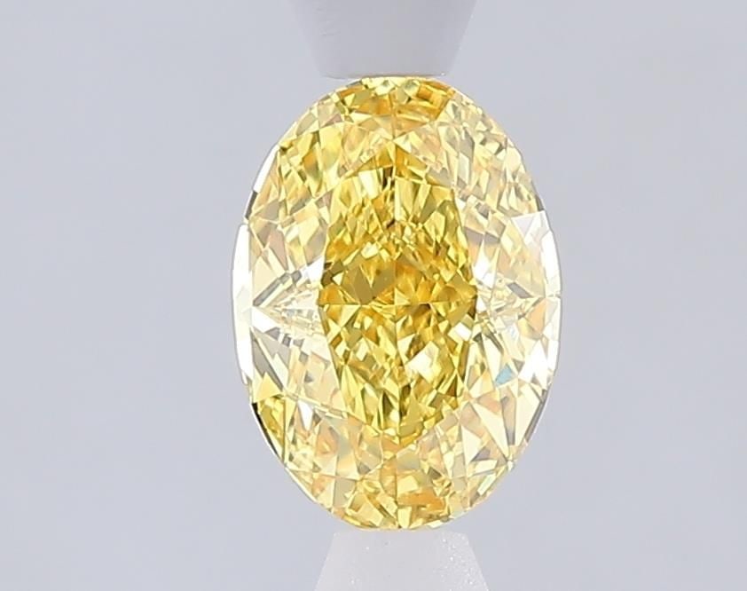 Loose Diamond - OVAL 1.0ct Fancy Intense Yellow VVS2: Loose Diamond - OVAL 1.0ct Fancy Intense Yellow VVS2 Source: This is a real non-mined Diamond that has been grown in a lab Shape: OVAL Carats: 1.0 Color: Fancy Intense Yellow Certification: IGI