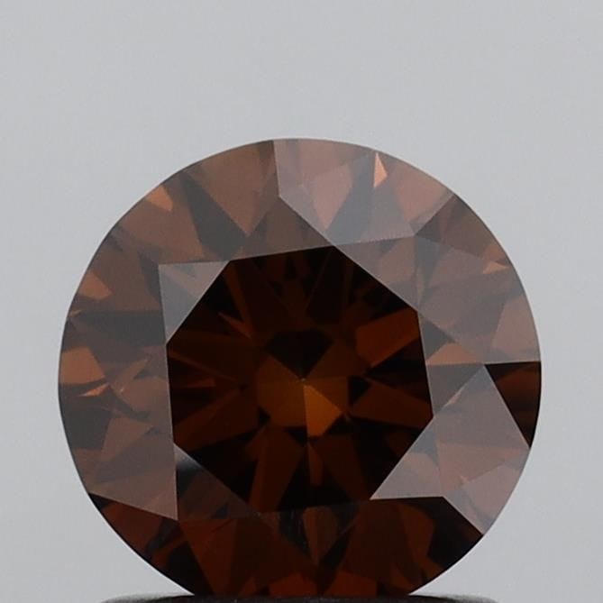 Loose Diamond - ROUND 1.01ct Fancy Deep Brown VS1: Loose Diamond - ROUND 1.01ct Fancy Deep Brown VS1 Source: This is a real non-mined Diamond that has been grown in a lab Shape: ROUND Carats: 1.01 Color: Fancy Deep Brown Certification: IGI Video: