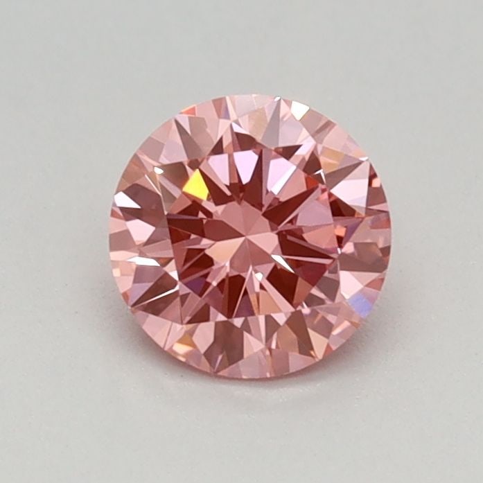 Loose Diamond - ROUND 0.43ct Fancy Vivid Pink VVS2: Loose Diamond - ROUND 0.43ct Fancy Vivid Pink VVS2 Source: This is a real non-mined Diamond that has been grown in a lab Shape: ROUND Carats: 0.43 Color: Fancy Vivid Pink Certification: IGI Video: