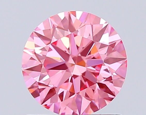 Ideal Loose Diamond - ROUND 1.04ct Fancy Vivid Pink VS1: Ideal Loose Diamond - ROUND 1.04ct Fancy Vivid Pink VS1 Source: This is a real non-mined Diamond that has been grown in a lab Shape: ROUND Carats: 1.04 Color: Fancy Vivid Pink Certification: IGI