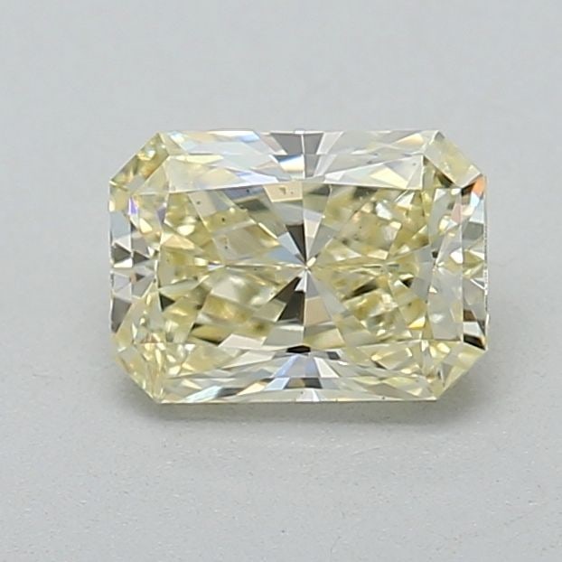 Loose Diamond - RADIANT 0.46ct Fancy Light Yellow VS2: Loose Diamond - RADIANT 0.46ct Fancy Light Yellow VS2 Source: This is a real non-mined Diamond that has been grown in a lab Shape: RADIANT Carats: 0.46 Color: Fancy Light Yellow Certification: IGI Vid