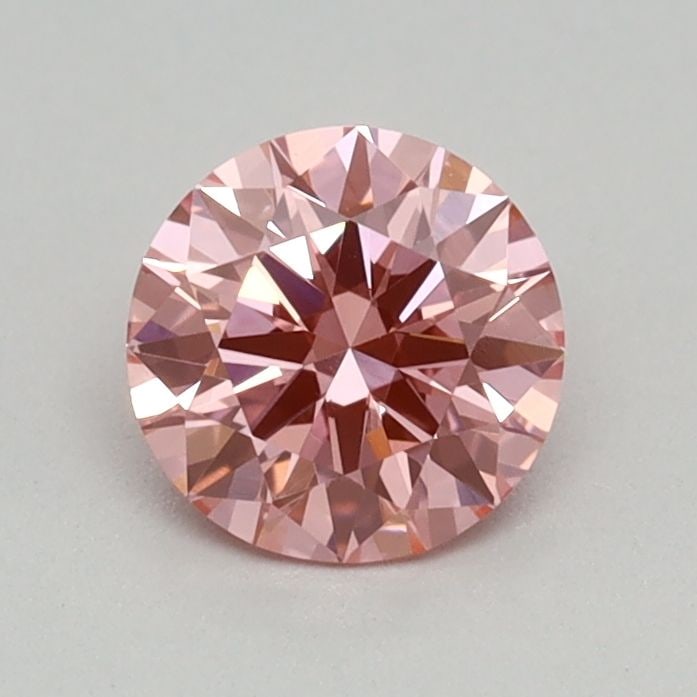 Loose Diamond - ROUND 0.38ct Fancy Vivid Pink VVS2: Loose Diamond - ROUND 0.38ct Fancy Vivid Pink VVS2 Source: This is a real non-mined Diamond that has been grown in a lab Shape: ROUND Carats: 0.38 Color: Fancy Vivid Pink Certification: IGI Video:
