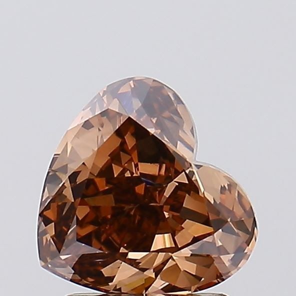 Loose Diamond - HEART 1.71ct Fancy Brown VS1: Loose Diamond - HEART 1.71ct Fancy Brown VS1 Source: This is a real non-mined Diamond that has been grown in a lab Shape: HEART Carats: 1.71 Color: Fancy Brown Certification: IGI Video: Video Link 