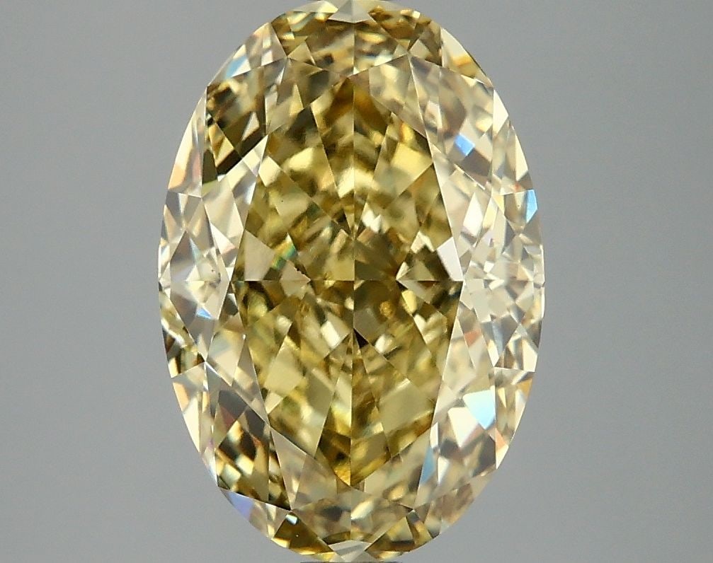 Loose Diamond - OVAL 4.1ct Fancy Intense Yellow VS1: Loose Diamond - OVAL 4.1ct Fancy Intense Yellow VS1 Source: This is a real non-mined Diamond that has been grown in a lab Shape: OVAL Carats: 4.1 Color: Fancy Intense Yellow Certification: IGI