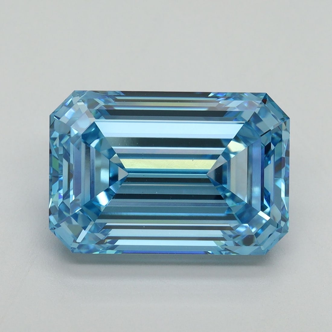 Loose Diamond - EMERALD 7.09ct Fancy Vivid Blue VS1: Loose Diamond - EMERALD 7.09ct Fancy Vivid Blue VS1 Source: This is a real non-mined Diamond that has been grown in a lab Shape: EMERALD Carats: 7.09 Color: Fancy Vivid Blue Certification: IGI