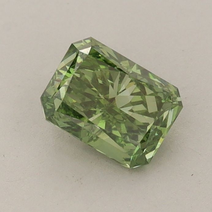 Loose Diamond - RADIANT 0.73ct Fancy Vivid Green VVS2: Loose Diamond - RADIANT 0.73ct Fancy Vivid Green VVS2 Source: This is a real non-mined Diamond that has been grown in a lab Shape: RADIANT Carats: 0.73 Color: Fancy Vivid Green Certification: IGI