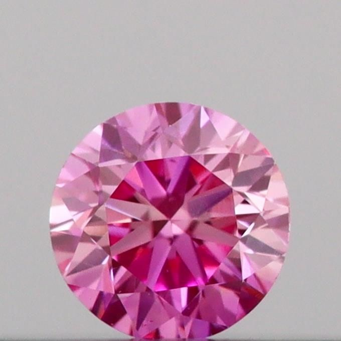 Loose Diamond - ROUND 0.12ct Fancy Vivid Pink VS1: Loose Diamond - ROUND 0.12ct Fancy Vivid Pink VS1 Source: This is a real non-mined Diamond that has been grown in a lab Shape: ROUND Carats: 0.12 Color: Fancy Vivid Pink Certification: IGI Video: