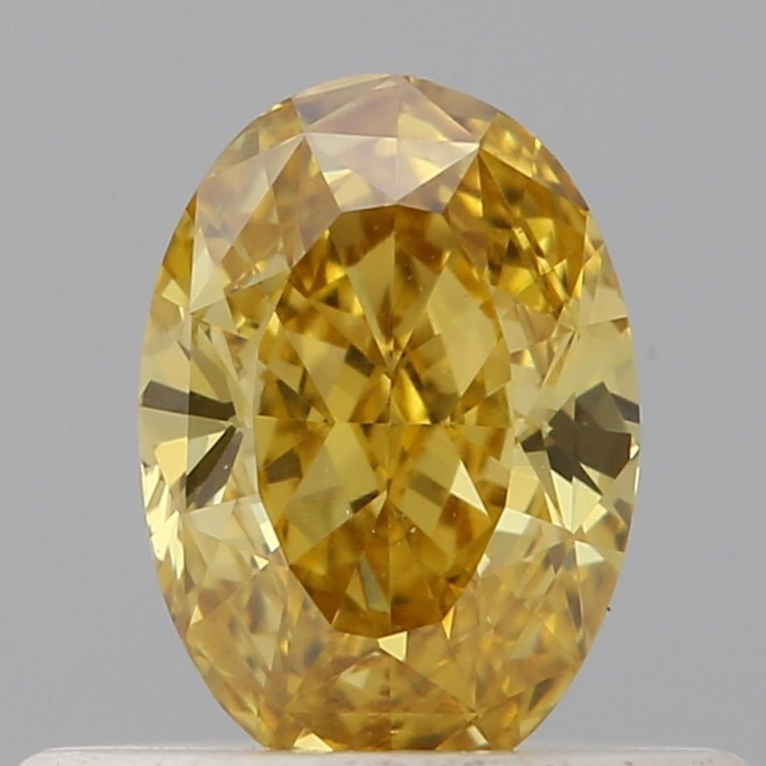 Loose Diamond - OVAL 0.4ct Fancy Deep Orangey Yellow VS2: Loose Diamond - OVAL 0.4ct Fancy Deep Orangey Yellow VS2 Source: Natural Shape: OVAL Carats: 0.4 Color: Fancy Deep Orangey Yellow Certification: GIA Video: