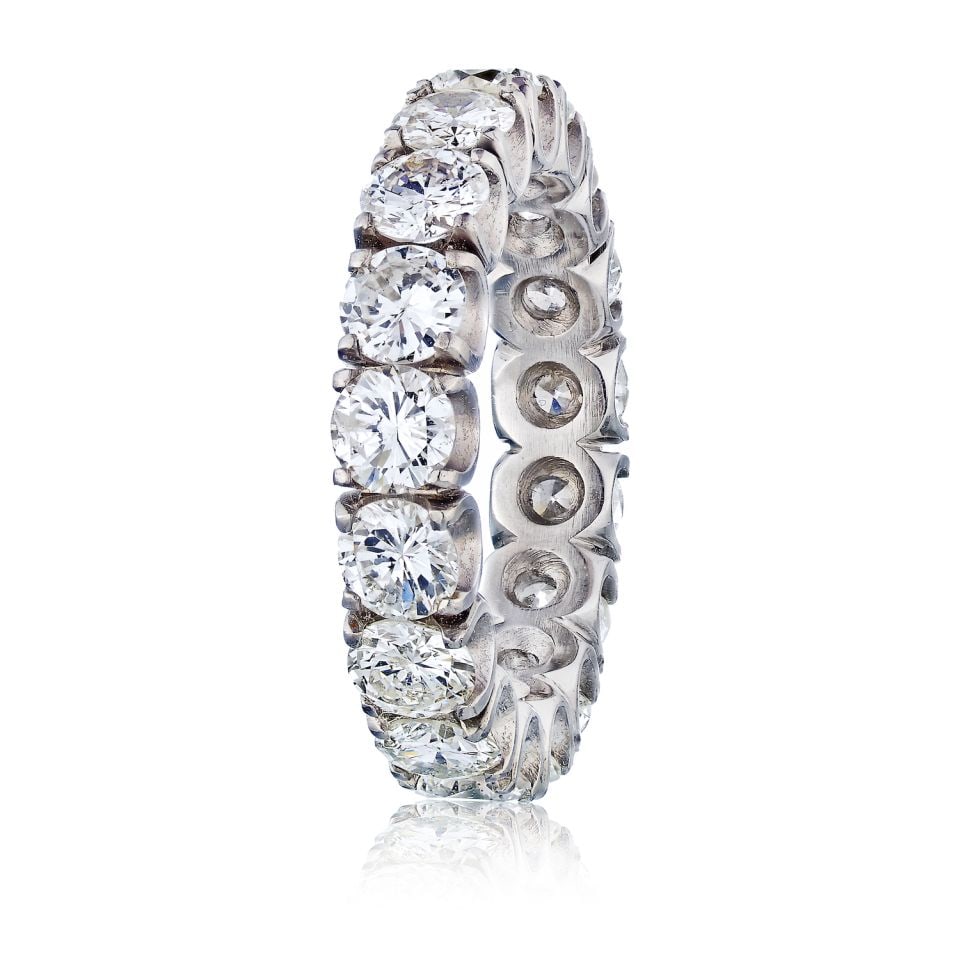 Platinum U-Shape Eternity Band 5.00ct Round Cut Diamonds: Platinum U-Shape Eternity Band 5.00ct Round Cut Diamonds This stunning Platinum Eternity Band features a total of 5.00 carats of round brilliant-cut diamonds, securely set in a U-shape design. Weighin