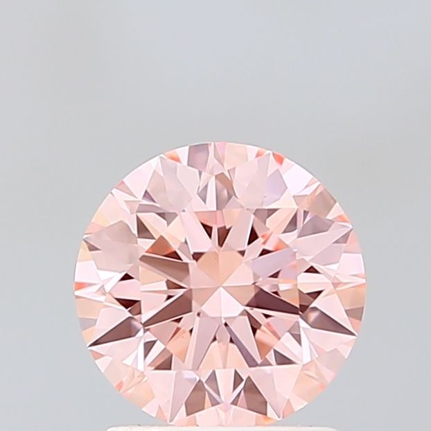 Ideal Loose Diamond - ROUND 1.55ct Fancy Vivid Pink VVS2: Ideal Loose Diamond - ROUND 1.55ct Fancy Vivid Pink VVS2 Source: This is a real non-mined Diamond that has been grown in a lab Shape: ROUND Carats: 1.55 Color: Fancy Vivid Pink Certification: IGI
