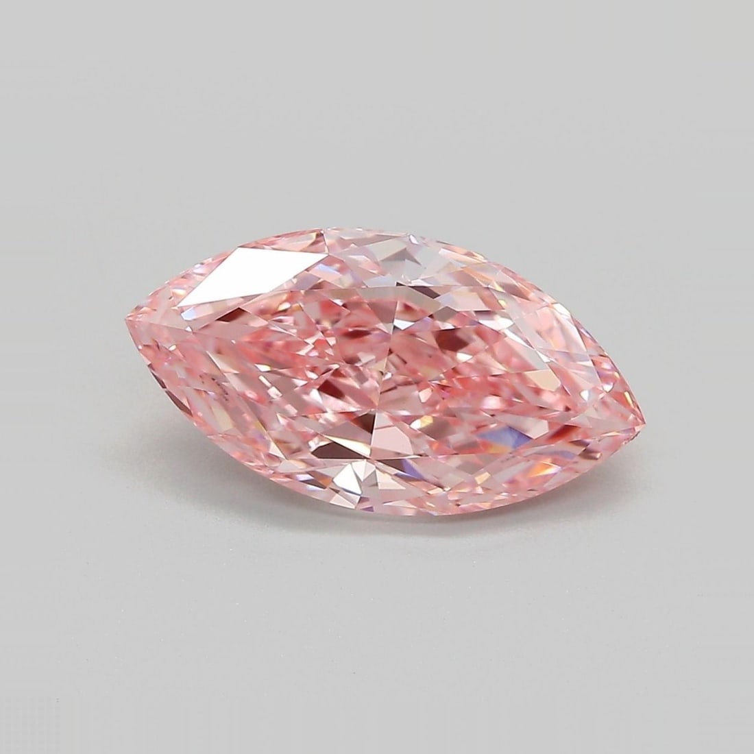 Loose Diamond - MARQUISE 3.05ct Fancy Vivid Pink VVS2: Loose Diamond - MARQUISE 3.05ct Fancy Vivid Pink VVS2 Source: This is a real non-mined Diamond that has been grown in a lab Shape: MARQUISE Carats: 3.05 Color: Fancy Vivid Pink Certification: IGI