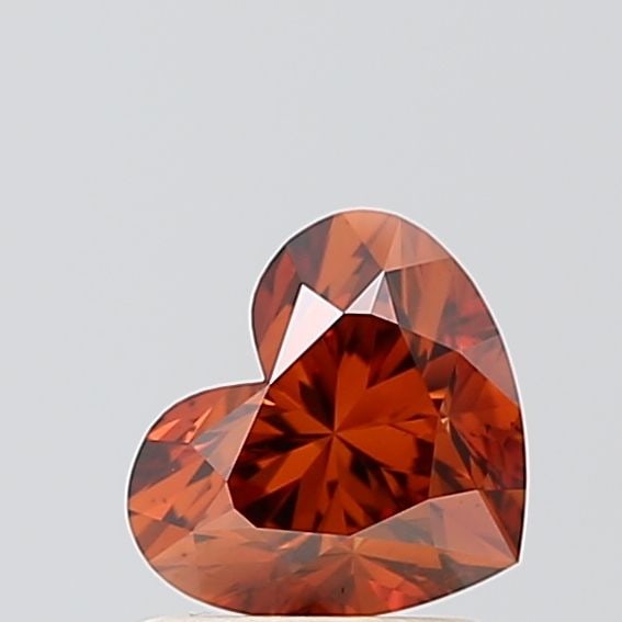 Loose Diamond - HEART 1.1ct Fancy Deep Orange VS2: Loose Diamond - HEART 1.1ct Fancy Deep Orange VS2 Source: This is a real non-mined Diamond that has been grown in a lab Shape: HEART Carats: 1.1 Color: Fancy Deep Orange Certification: IGI The Diamond