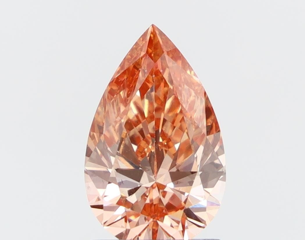 Loose Diamond - PEAR 1.44ct Fancy Orange VS2: Loose Diamond - PEAR 1.44ct Fancy Orange VS2 Source: This is a real non-mined Diamond that has been grown in a lab Shape: PEAR Carats: 1.44 Color: Fancy Orange Certification: NONE Video: